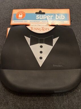 TUNNOTOTS Black Silicone Bib with White Tuxedo Graphic